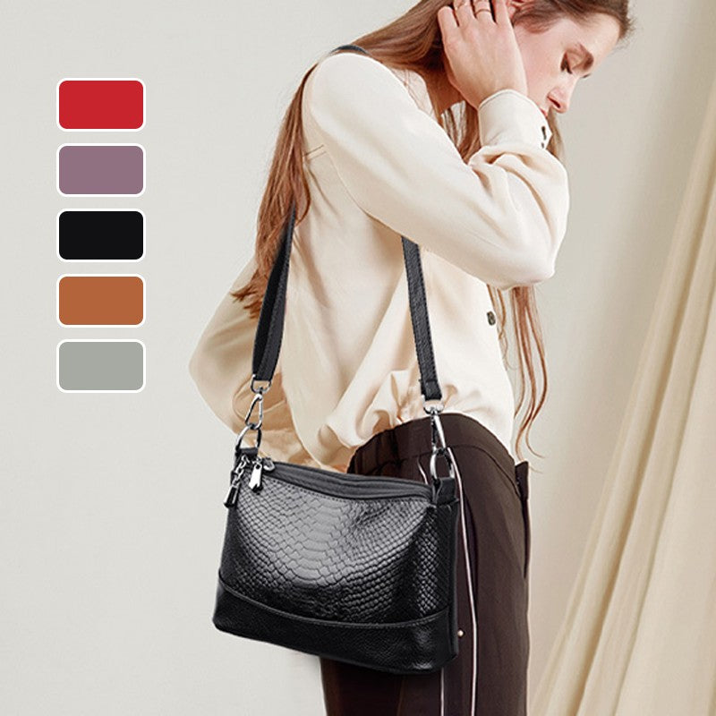 Fashionable shoulder bag with a crocodile print