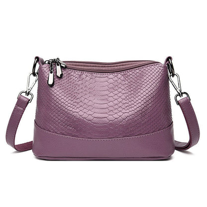 Fashionable shoulder bag with a crocodile print
